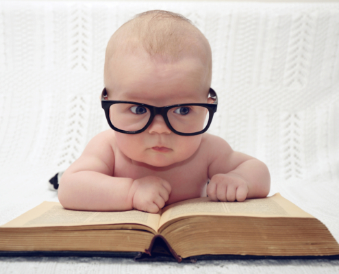 Cute Little Baby In Glasses